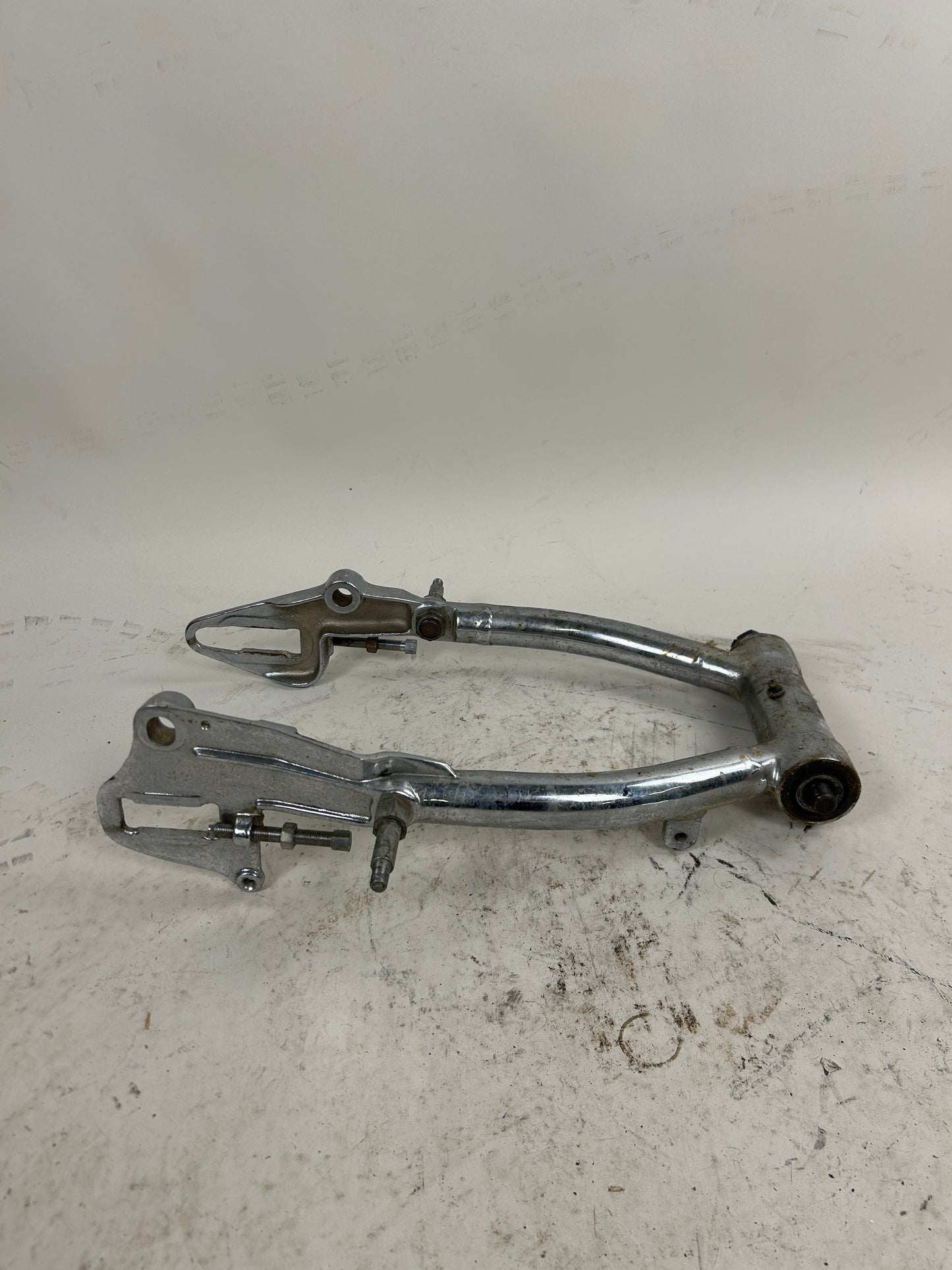 Crusty Chrome Round Swing Arm