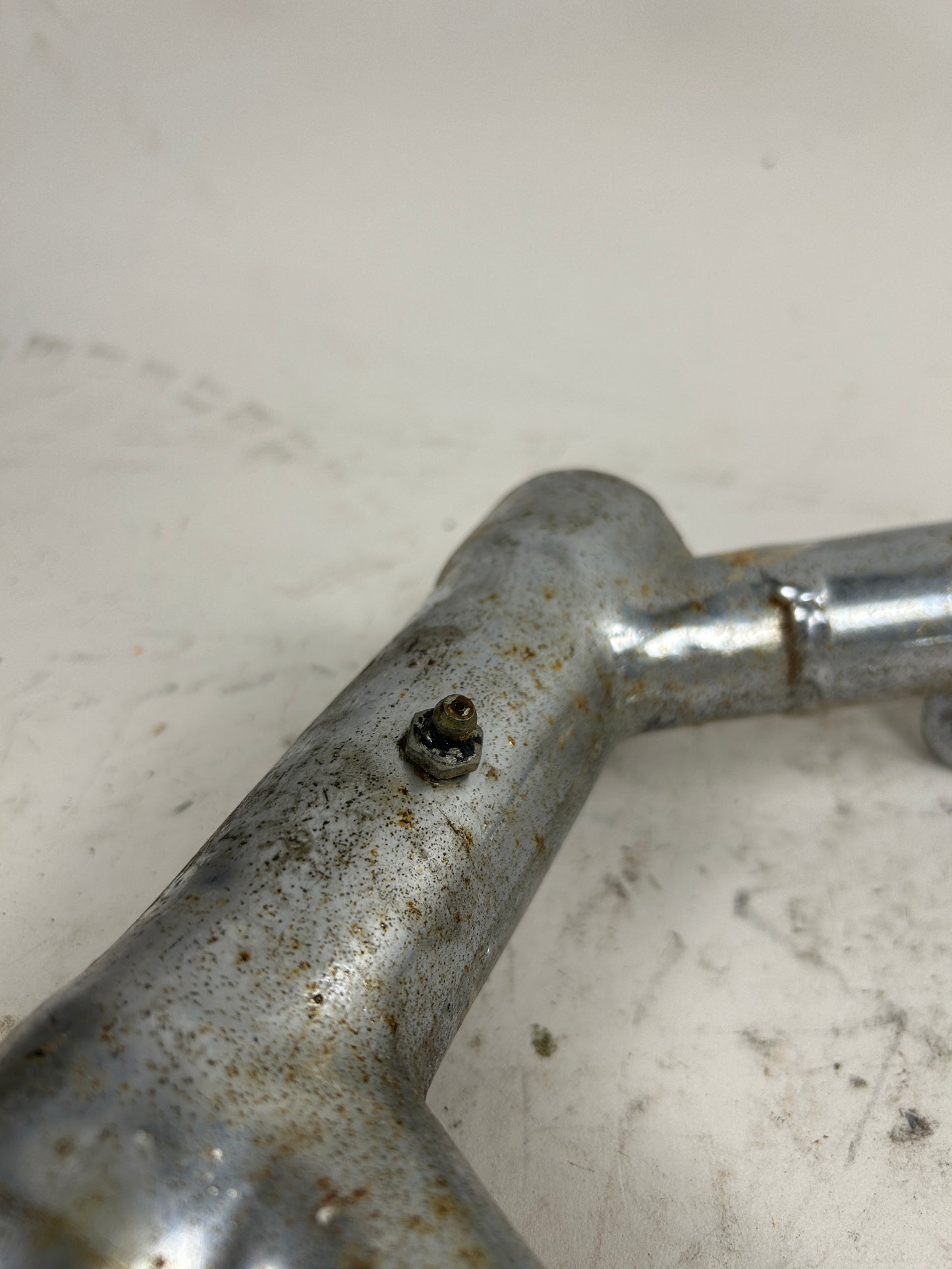 Crusty Chrome Round Swing Arm