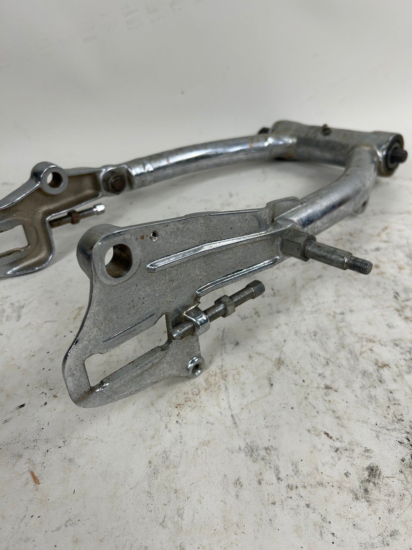 Crusty Chrome Round Swing Arm