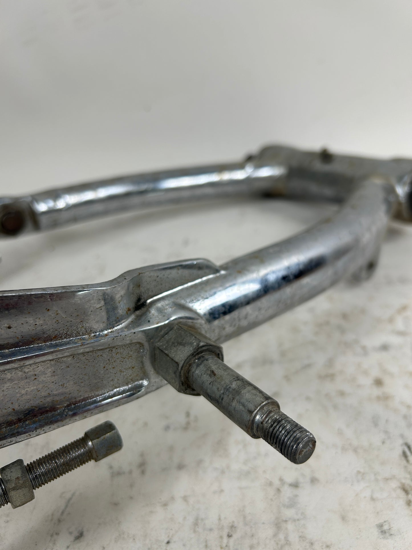 Crusty Chrome Round Swing Arm